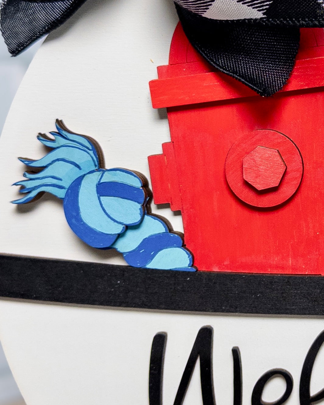 Close-up of a red fire hydrant with blue flames on a white background