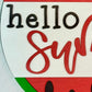Decorative sign with watermelon design and 'hello summer' text