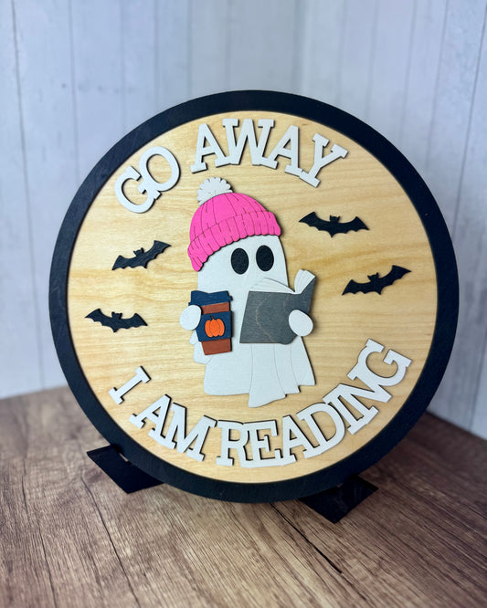 Go Away I'm Reading Round Shelf Sign